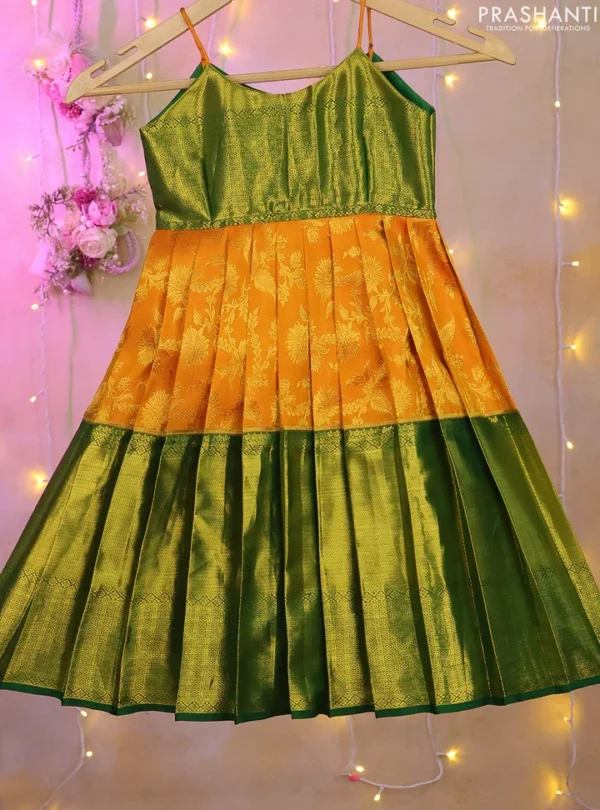 Silk kids frock green and mango yellow with zari woven brocade weaves and long zari woven border for 0-1 years