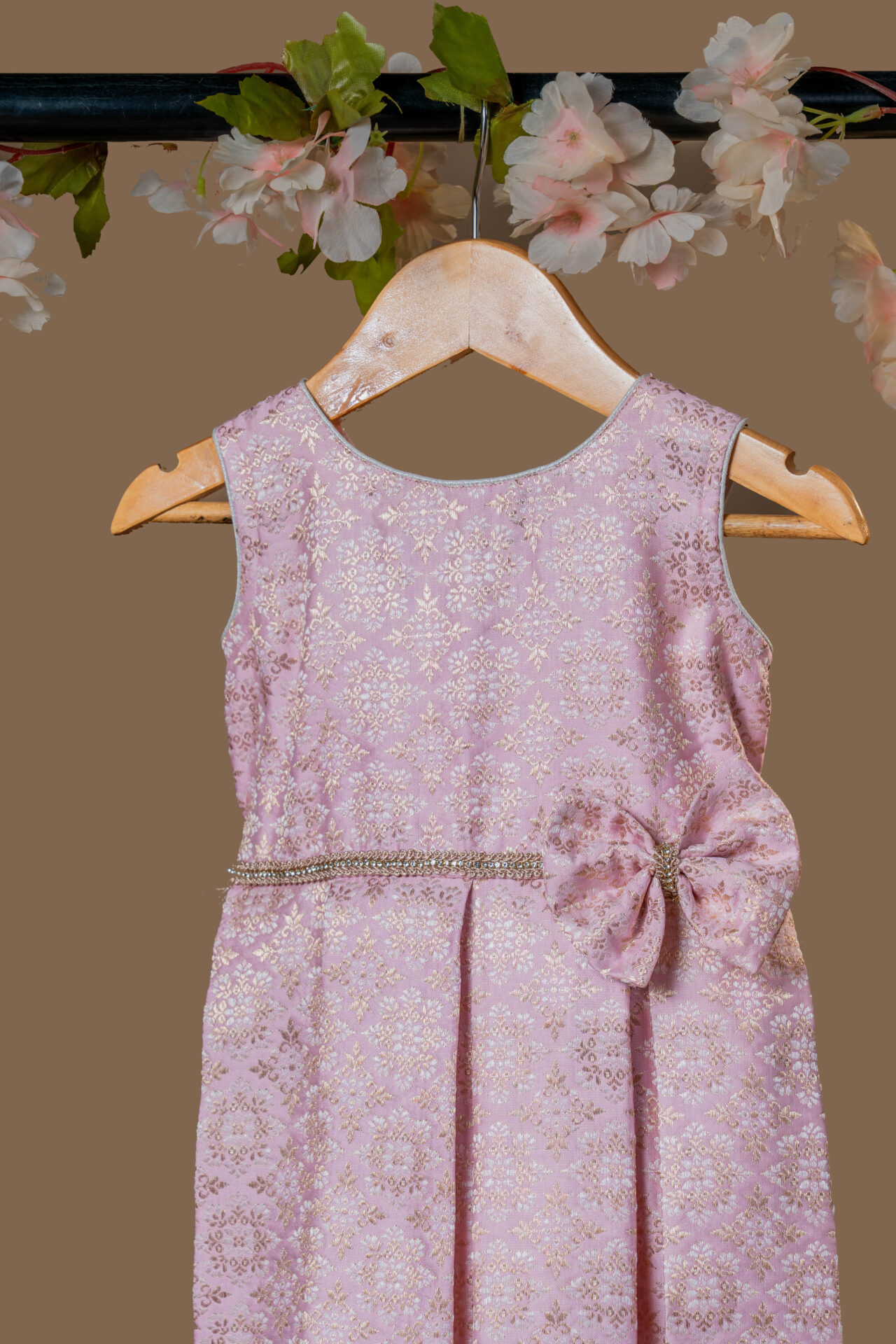 Elegant Pink Brocade Girl's Dress with Gold Weave, Rhinestone Waistband, and Oversized Bow.